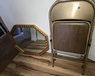 Folding chairs, gold framed mirror