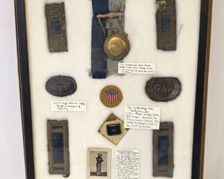 Insignia & patches of an identified Civil War Union soldier with the 54th Regiment Zouave unit of the Ohio Infantry.