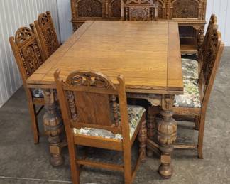 Antique carved oak dining room table & 6 chairs