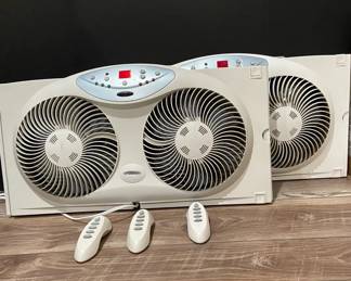 Two Bionaire Window Fans  Remotes