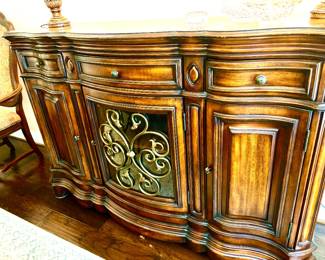 Impressive buffet with scroll metal trim