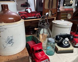 Vintage toy truck and antique telephones and vintage radios, including Bakelite