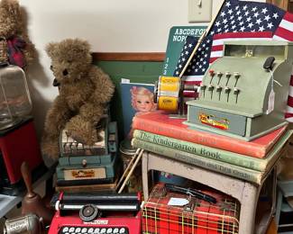 Typewriter, cash, register, and Boyd’s bears