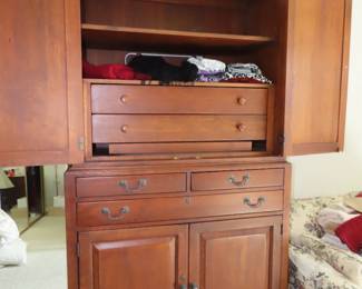 Large two piece TV/Clothing armoire with drawers.