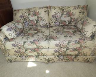 Floral loveseat.