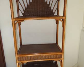 One of two vintage bamboo and rattan shelf sets.