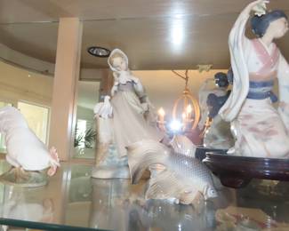 Lladro figures, Royal Copenhagn fish and rooster.