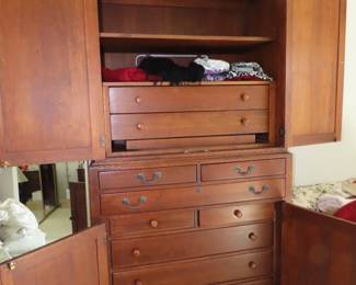 Large two piece TV/Clothing armoire with drawers.