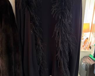 Black sweater with feather trim
