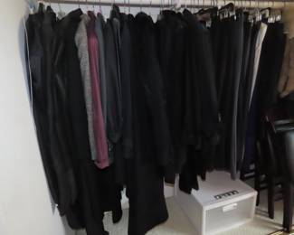 Lots of black clothing, large and medium sizes.