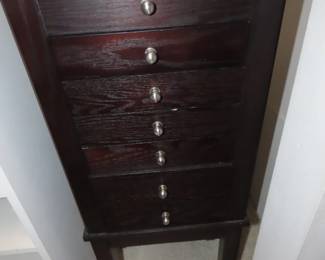 Free standing jewelry chest.