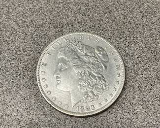 Seven Morgan silver dollars