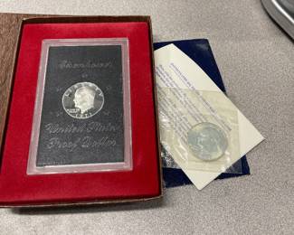 Two silver Eisenhower dollars