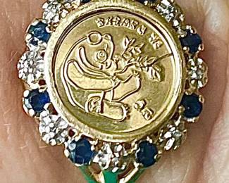 10 carat ring with tiny diamonds and sapphires