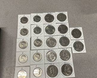 Collection of Eisenhower dollars and bicentennial Kennedy half dollars