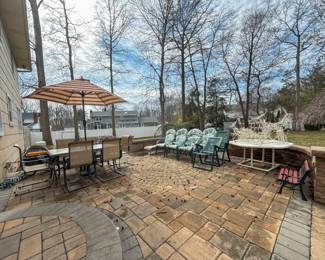 Full Patio Overview Showing Patio Furniture, Generator, and Outdoor Items