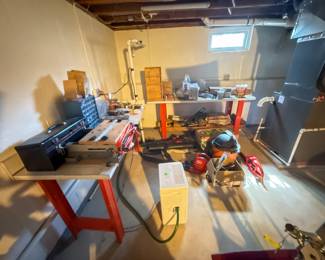 Garage items including tools, hardware, and workshop equipment