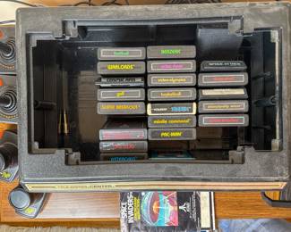 Vintage Atari Video Computer System with Controllers and Game Cartridges