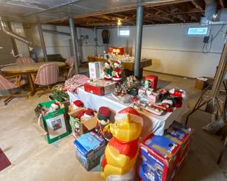 Holiday décor collection including Christmas figurines, ornaments, and seasonal decorations