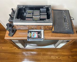 Vintage Atari Video Computer System with Controllers and Game Cartridges