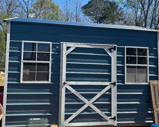 Metal building to b moved by buyer. Wired for electricity