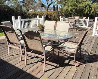Oval Glass Top Patio Dining Set with Four Sling Chairs