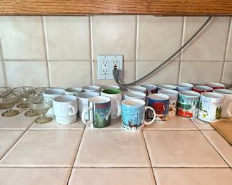Collection of Promotional Christmas Mugs and Glassware