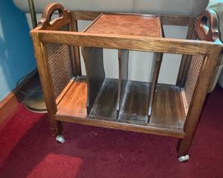 Vintage Wooden Magazine Rack with Cane Sides and Casters