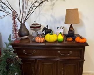 Vintage Dark Wood Sideboard with Decorative Accents