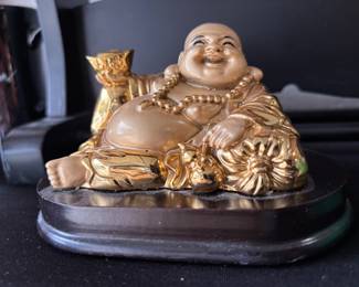 Golden Laughing Buddha statue