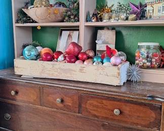 vintage Christmas ornaments dresser