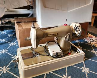 DRESSMAKER Sewing Machine, one of two sewing machines
