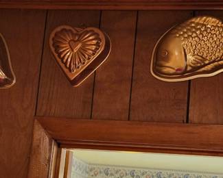 There are several Copper Molds, various sizes, shapes