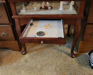 Shadowbox, Glasstop table with small drawer