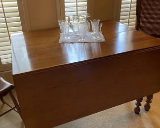 Beautiful (1898?) Drop Leaf Table with Gate Legs. Extends to 54 x 54". Recent appraisal performed.