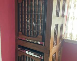 Wine cabinets.  Bottom one works.  Top one does not....great for storage