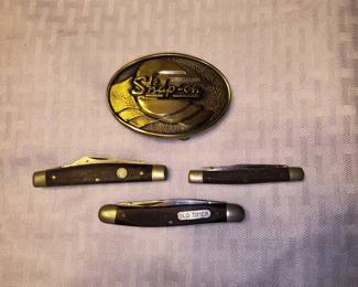 Snap-on belt buckle and early pocket knives
