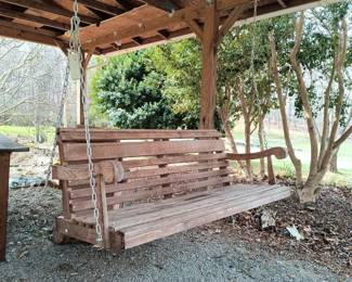 Wooden porch swing