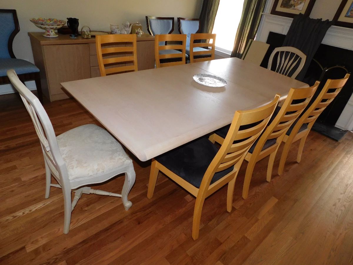 VINTAGE DANISH MODERN DINING TABLE WITH 6 SIDE CHAIRS AND 2 END CHAIRS. CUSTOM PADS