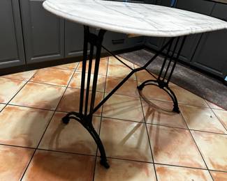 Table used here as a kitchen island prep center