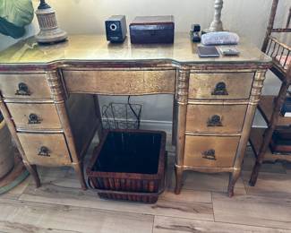 Gold desk id deeper color than appears with glass top