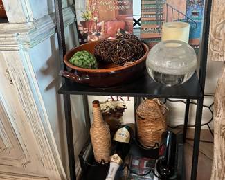 Bigger bottles rack, many decor books in many places 