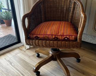 Easy rolling wicker office chair