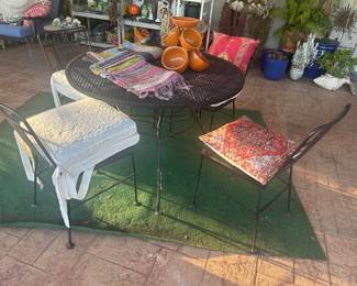 Metal patio set round table and four chairs, cushion options sold separately 41” diameter 