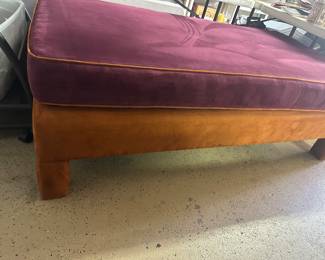 Large lounger with reversible top cushion in violet over orange velveteen base is 38 x 71 x 23 high