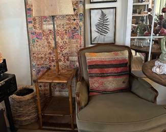 One of two olive green arm chairs, 