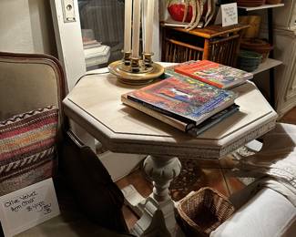 White octagon table is 28 inches across top