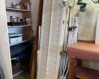 Full length shutters and assorted bamboo shades