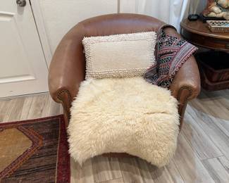 Camel color leather Swivel rocker with dressing
