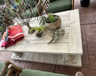 Oversized coffee table great between sets of patio chairs